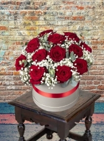 Stunning Hatbox arrangement of 12 large Headed red roses with Gypsophila